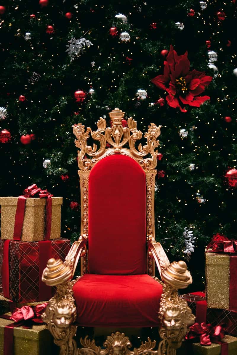 gold and red throne beside gift boxes